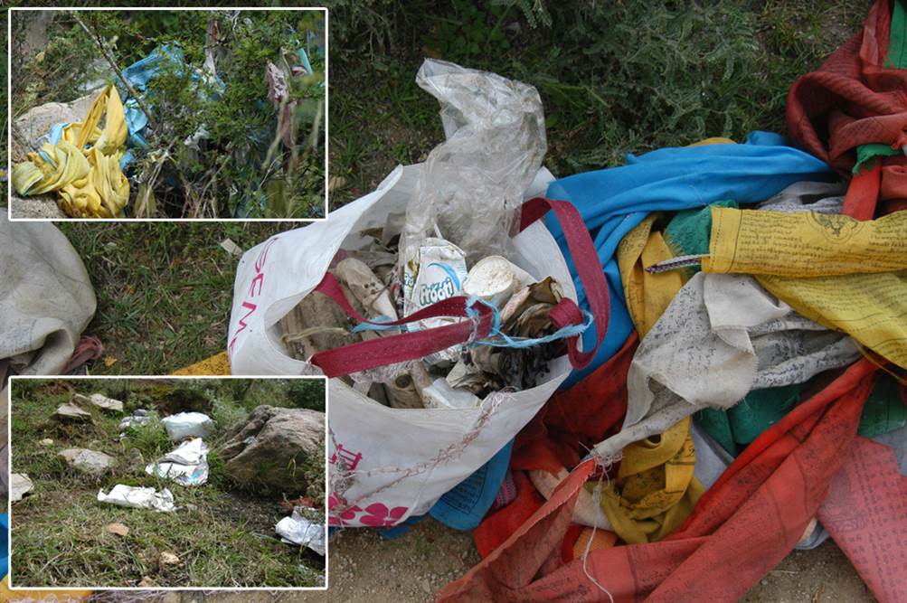 As there are too many worshipers and visitors,old prayer flags and other garbage covered surface of the hill, which stunts growing of grass and makes it impossible to feed local flocks and herds.