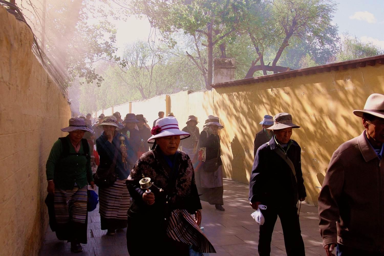 Worshipers pray around the Potala Palace as they do everyday.