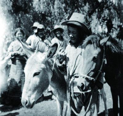 Klsang, who worked as groom for the chamberlain of serf owner Surkhang for 30 years, receives a donkey during the democratic reform.