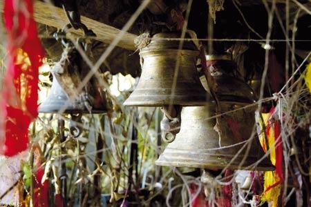 Bells inside a Hindu mountain shrine.【Photo: Kyle Yeates】 By now, we had crossed over the 4,000-meter tree line to enter a desolate and stark landscape composed entirely of rocks, ice, dirt and snow.