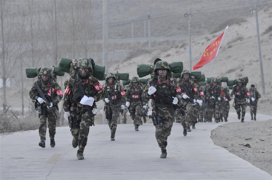 Photo taken on November 28, 2015 shows that special combat soldiers of Tibet Armed Police Corps are proceeding rapid march training. [Photo/Liu Dongjun] On November 28, 2015, Tibet Armed Police Corps launched “2015 snowland warrior” limitation troop training in Lhasa, aiming at testing as well as improving the special combat soldiers’ military capabilities and anti-terrorist capacities under the high-cold and oxygen deficit environment. The training will last till December 4, 2015.