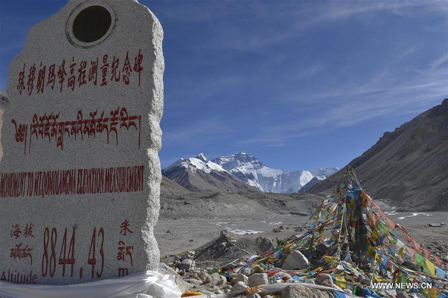 Photo taken on Nov. 19, 2015 shows a height monument of Mount Qomolangma, the highest peak in the world which stands at an altitude of 8844.43 meters, in southwest China