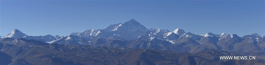 Photo taken on Nov. 19, 2015 shows a distant view of Mount Qomolangma, the highest peak in the world which stands at an altitude of 8844.43 meters, and surrounding peaks, in southwest China