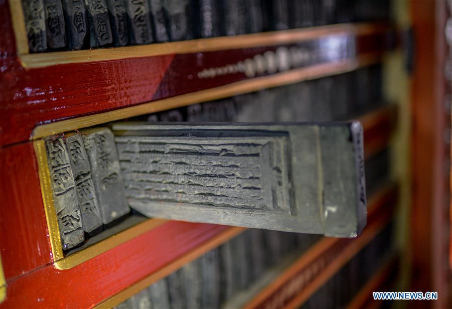 Photo taken on Jan. 4, 2016 shows ancient Buddhist texts in Cagar Monastery on the mountain in Gyirong Township of Gyirong County, Shigatse City, southwest China