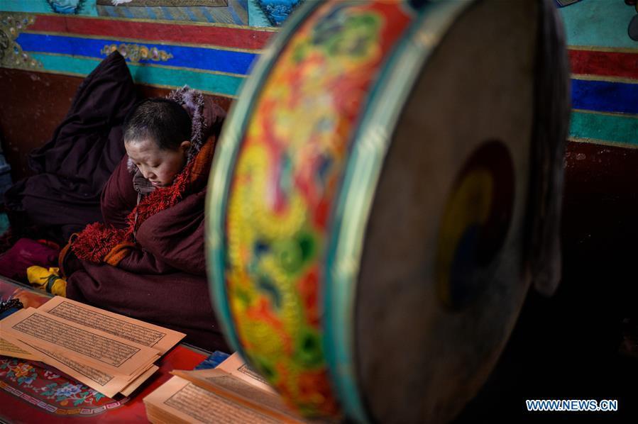 A Buddhist chants in Cagar Monastery on the mountain in Gyirong Township of Gyirong County, Shigatse City, southwest China