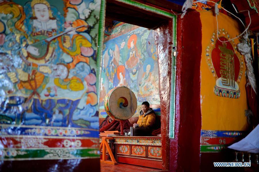 A Buddhist chants in Cagar Monastery on the mountain in Gyirong Township of Gyirong County, Shigatse City, southwest China