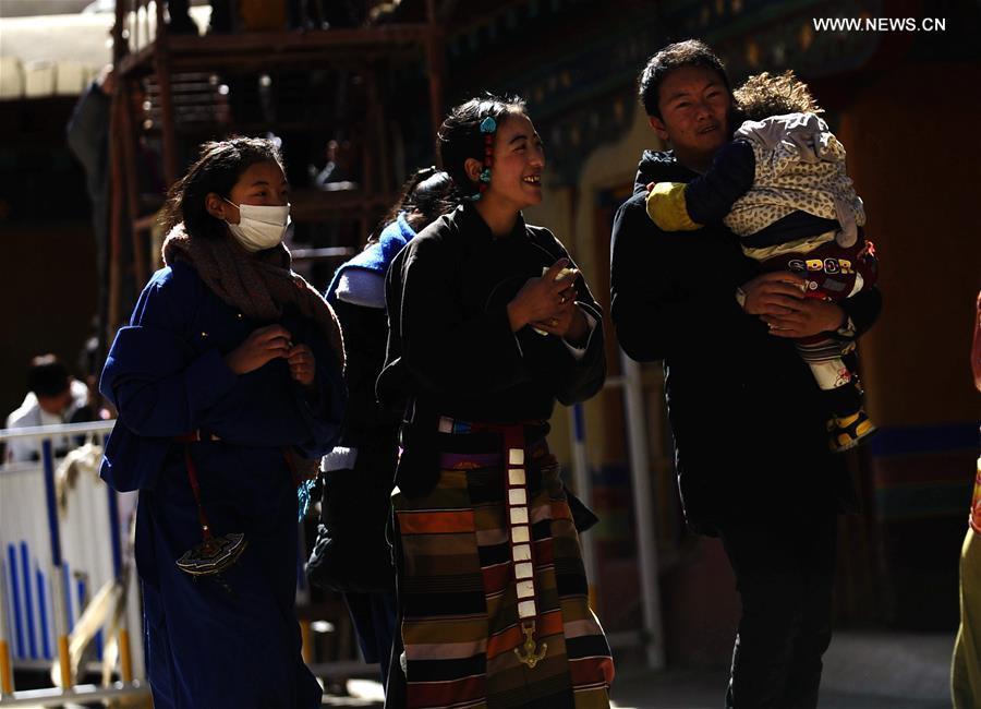 Tibetan Buddhism believers are seen at Drepung Monastery in Lhasa, capital of southwest China