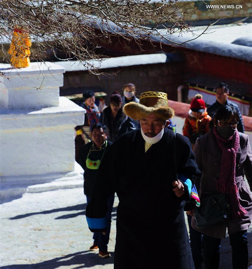 Tibetan Buddhism believers are seen at Drepung Monastery in Lhasa, capital of southwest China