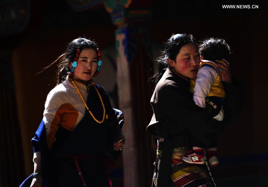 Tibetan Buddhism believers are seen at Drepung Monastery in Lhasa, capital of southwest China