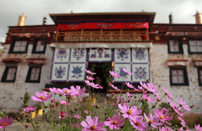 Sanga Monastery is a small Tibetan Buddhist monastery located in the town of Dagze in Dagze County, Lhasa, Tibet. The temple grounds cover about 15 acres, and the building covers 2,343 square metres. The Lhasa River can be seen from the rear of the monastery. Diagonally above the monastery on the hillside are the ruins of a hilltop fort. The monastery was built in 1419. It is part of the Gelug sect, and is under the jurisdiction of Ganden Monastery.